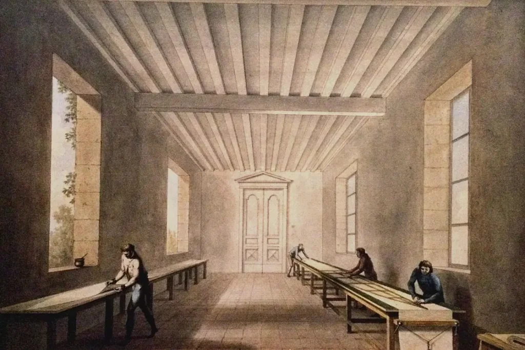 لوحة تجسد عملية صناعة البالونات الفرنسية بإحدى الورشات