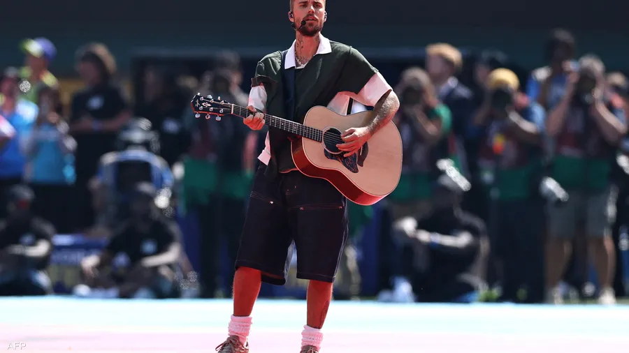 BTS The South Korean group took to the stage in matching black and red outfits to perform their upbeat hit Dynamite